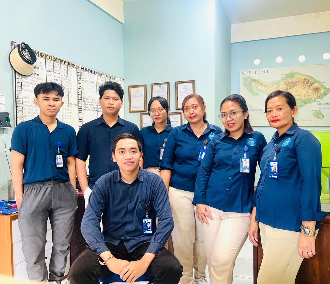 Two women working at a desk in an office environment